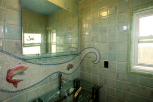 Custom porcelain tile, glass and custom fish bathroom 