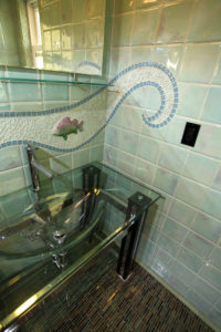 Custom porcelain tile, glass and custom fish bathroom 