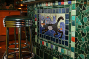 Stoneware kitchen with custom tile mural