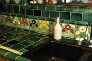 Stoneware kitchen with custom deco poppy tile