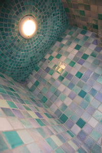 Bathroom shower mosaic with custom ceramic fish