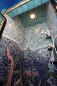 Bathroom shower mosaic with custom ceramic fish