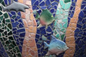 Bathroom shower mosaic with custom ceramic fish