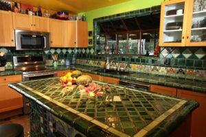 Stoneware kitchen with custom deco poppy tile